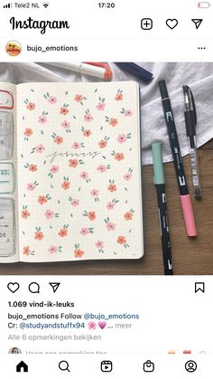 the instagram page on instagram shows an open notebook and pens