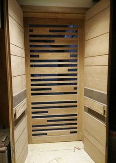 the inside of a sauna with wooden slats