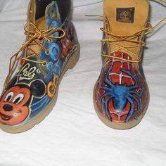 Hand Painted And Signed Featuring Some Iconic Characters From Movies And Comics. Beautifully Designed And Painted With Great Style. The Condition Looks Perfectly Clean At The Soles. No Scratches On The Boots And They Are Original Timberlands As Well. Leather With A Very Good Sole. These Will Be One Of A Kind And Be Noticed Wherever They Are Seen. Free Shipping Is Included For These Gorgeous Shoes. Custume Shoes, Timberland Suede Boots, Custom Timberland Boots, Brown Timberland Boots, Fall Moodboard, Black Hiking Boots, Characters From Movies, Timberland Boots Black, Timberland Boots Mens