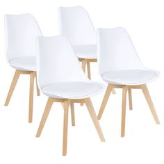 four white dining chairs with wooden legs