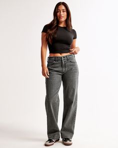 Our Curve Love low rise baggy jeans in a whitefill black wash with a clean hem. This fit features a 8.5” low rise, is slightly relaxed at waist and hips, and eases at the thigh into a baggy, full-length leg shape. We recommend buying your true size for a baggier fit. Size down for a closer fit. The viral fit that eliminates waist gap: Curve Love features additional room through the hip and thigh for curve-hugging comfort. This jean is made from our vintage stretch fabric which features both an authentic vintage look and contains slight built-in stretch for additional comfort. Low Baggy Jeans, Low Rise Baggy Jeans, Baggy Jean, Abercrombie Jeans, Women's Bottoms, Dark Denim Jeans, Baggy Jeans, Baggy Fits, Dark Denim