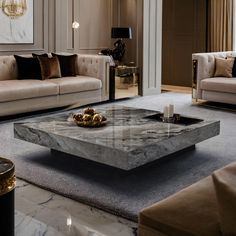 a marble coffee table in a living room