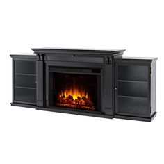 an entertainment center with a fire place and shelves on the sides, in front of a white background