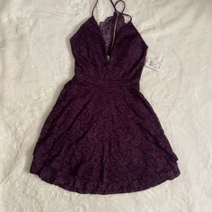 Condition: New - Nwt Original Price: $49.90 Sale Price: $39.87 Brand: Windsor Color: Sparkling Plum Size: Small & Large Material: Exterior: 77% Polyester, 21% Nylon, 2% Spandex, Lace/ Interrior: 100% Polyester Jersey V-Neck Neckline, Tiered Short Lace, With Sheer Back. Plum Homecoming Dress, Grad Party Dress, Dresses Windsor, Sweetheart Homecoming Dress, Glitter Mini Dress, Purple Lace Dress, Plum Dress, Velour Dress, Floral Skater Dress