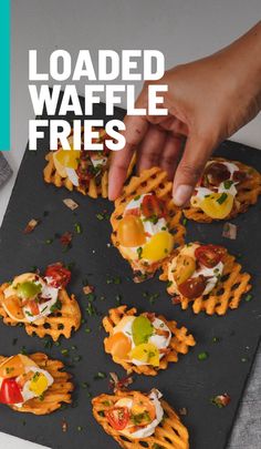 loaded waffle fries on a tray with the words loaded waffle fries above them