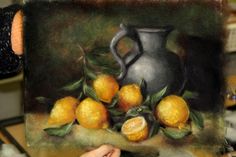 a painting of oranges in a vase on a table