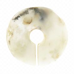 a white marble object with a circular hole in the center on a transparent background png