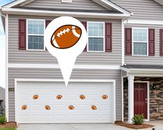 a house with a football marker on the front