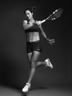 a woman holding a tennis racquet on top of a black and white photo