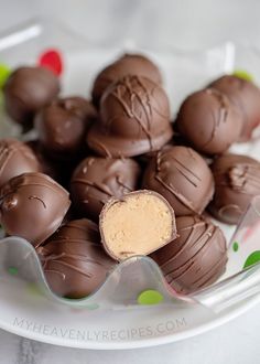 a plate full of chocolate candies with peanut butter