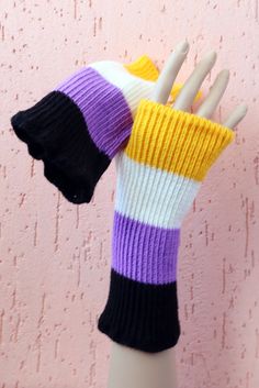 nonbinary pride slouchy yellow, white, purple, black gloves These gloves work well with the following accessories: https://www.etsy.com/listing/267817137/pride-scarf-hat-lgbtqpride-nonbinary?ref=shop_home_active_29&frs=1&crt=1 https://www.etsy.com/listing/1026136966/nonbinary-pride-gift-hand-knitted-boot?ref=shop_home_active_3&frs=1 Shipping time is 1-2 weeks to Europe and 3-4 weeks to the rest of the world but it can take few days more. Colors may vary based upon your screen resolut Enby Clothes Ideas, Outfits To Wear To Pride, Pride Outfit Ideas Nonbinary, Pride Accessories Diy, Nonbinary Aesthetic, Pride Clothes, Pride Festival, Happy Monster, Gay Outfit