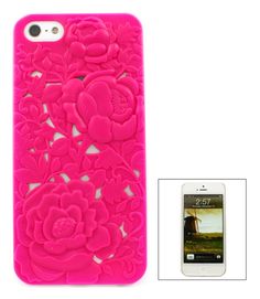 a pink case with flowers on it and a cell phone next to the case is shown