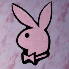 an image of a pink rabbit with a bow tie on it's head and ears