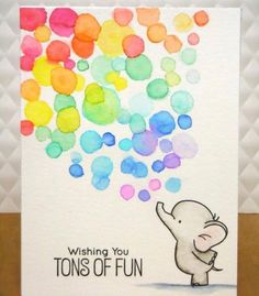 a card with an elephant blowing confetti on it's face and saying wishing you tons of fun