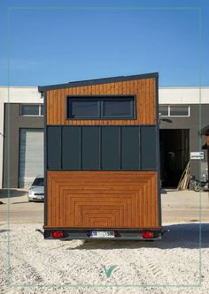 the tiny house is made out of wood and metal