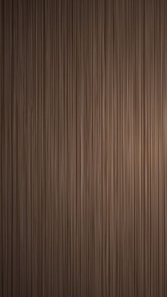 a dark brown background with vertical lines