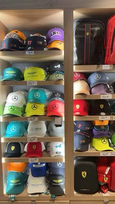 the shelves are filled with hats and luggage