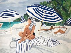 a woman sitting on top of a bed under an umbrella next to other people laying in the sand