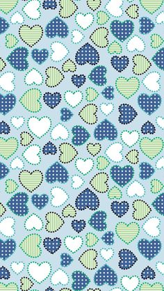 a blue and green heart pattern with white polka dots on the bottom, in different colors