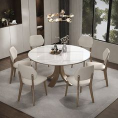 This dining table is an ideal choice for modern families because of its scratch resistant and easy cleaning characteristics of the sintered stone plate, combined with the stable design of multi-layer solid wood board support and solid wood base. It is not only an indispensable piece of furniture in your home, but also a symbol of your quality of life. LABAORRY Size: 29.5"H x 53.1"L x 53.1"W | LABAORRY Modern light luxury simple round dining table sets brownWood in White;gray | 29.5"H x 53.1"L x Simple Round Dining Table, Dining Table Sets, Round Dining Table Sets, Round Wood Dining Table, Stone Plate, Stables Design, Table Sets, Sintered Stone, Wood Laminate