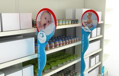 two baby products are displayed on shelves in a store