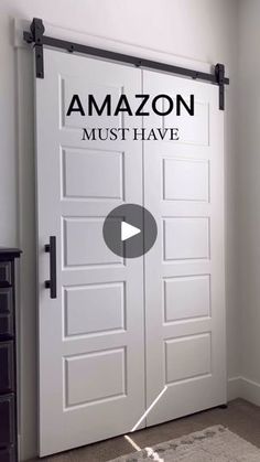 a white door with the words amazon must have on it