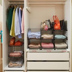 an organized closet with clothes and handbags