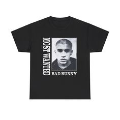 Elevate your style with these Bad Bunny Most Wanted Album Tour Merch Tees! 🐰🎤 Available in all sizes, this KyotoStreetMarket collection is a must-have for any fan. Get yours now! #BadBunny #TourMerch #KyotoStreetMarket #LimitedEdition #MusicFans 🎶 Cool Graphic Print Tops For Concert, Bad Bunny Jersey, Bad Bunny Class Shirts, Bad Bunny Shirts Men, Bad Bunny Graphic Tees, Bad Bunny Personalized Shirt, Tour Merchandise, Tour Merch, T Shirt Picture