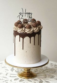 a birthday cake with chocolate frosting and sprinkles