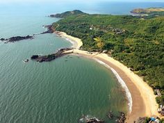 an aerial view of the beach and ocean