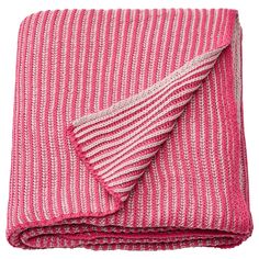 pink and white striped blanket folded on top of each other