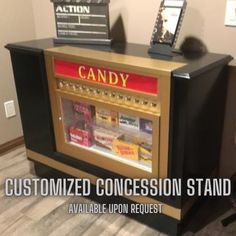 a candy dispenser sitting on top of a wooden table