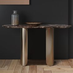 a table with two vases sitting on top of it next to a wooden floor