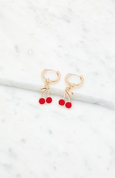 Accessorize with a pop of sweetness with the Cherry Charm Hoop Earrings from LA Hearts. These adorable earrings feature playful cherry charms dangling from sleek hoops, adding a fun and fruity flair to any look.


	Mini hoop earrings
	Huggie closure
	Cherry charm
	Gold finish Cherry Charm, Slim Fit Cargo Pants, Heeled Rain Boots, High Heel Rain Boots, Mini Hoop Earrings, Lingerie Bag, Shoe Boot Sandals, Backpack Tote Bag, Boot Accessories