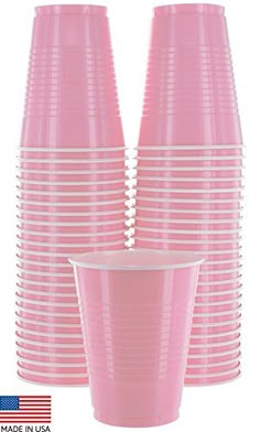 pink plastic cups are stacked on top of each other