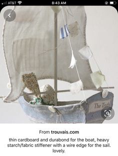 an image of a boat that is made out of cloth and fabric material with the caption from trouvis com thin cardboard and diamond for the boat