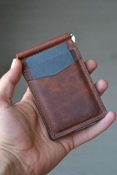 Handmade leather wallet with money clip | Bifold Slim Cardholder for Men | Personalized Wallet | Unique Gift We present to you a fully handcrafted genuine leather money clip wallet for men 😍. With the durability of handmade craftsmanship and genuine leather, this is the best gift for men. Its slim design and functional clip offer a solution to all your needs without taking up too much space. PERSONALIZATION *You can add up to 8 uppercase letters to the front of the wallet, or order it in the cl Wallet With Money, Leather Money Clip Wallet, Personalized Leather Wallet, Leather Money Clips, Leather Cardholder, Handmade Leather Wallet, Personalized Wallet, Clip Wallet, Genuine Leather Wallets