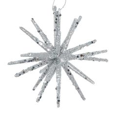 an ornament shaped like a snowflake with lots of sparkles on it