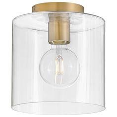 a light fixture with a clear glass cover and gold trim on the bottom half of it