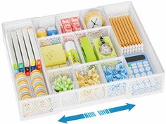 an organized drawer with pens, pencils, markers and other office supplies in it