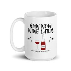 a white coffee mug with the words run now wine later and a glass of wine