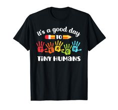 PRICES MAY VARY. Solid colors: 100% Cotton; Heather Grey: 90% Cotton, 10% Polyester; All Other Heathers: 50% Cotton, 50% Polyester Imported Pull On closure Machine Wash Cute design with colorful hand prints that says It's A Good Day To Teach Tiny Humans. Funny tee to wear at school for art teacher with young students. Fun gift idea for a pre K, kindergarten, elementary and primary teacher. Great for both men and women to wear at the first day of school or whenever teaching first grade, second gr Preschool Teacher Shirts, Primary Teacher, Teachers Aide, Teacher Teaching, Hand Prints, It's A Good Day, Teaching First Grade, Primary Teachers, Funny Teacher