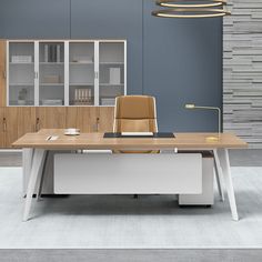 an office with a desk, chair and cabinets