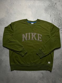 Vintage Crewneck Nike boxy center swoosh y2k fits logo USA 🇺🇸 Size Men's / US XXL / EU 58 / 5 Color Green olive Condition Gently Used Nike Vintage central logo central swoosh crewneck 80s 90s 00s retro spellout y2k sweatshirt centre swoosh big logo.   The material is pleasant to the body. In a good condition. Fast sending! Condition : 9/10 Chest - 68 cm Length - 72 cm Shoulders - 56 cm Sleeve Length - 67 cm - ALL ITEMS ARE HEAT TREATED AND WASHED BEFORE SHIPPING - FOLLOW MY STORE - SEE MY OTHE Collegiate Sweatshirt With Logo For Streetwear, Collegiate Logo Tops For Streetwear, Collegiate Tops With Logo For Streetwear, Collegiate Tops With Logo Detail For Streetwear, Sporty Sweatshirt With Logo And Relaxed Fit, Urban Sweatshirt With Logo Print For Sports, College Crew Neck Sweatshirt With Logo, Urban Style Logo Print Sweatshirt For Sports Events, Urban Sweatshirt With Logo For Sports Events