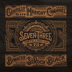 the seven three distilling co logo is shown in gold and black on a wooden background