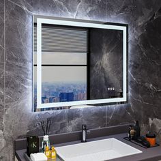 a bathroom sink with a large mirror above it