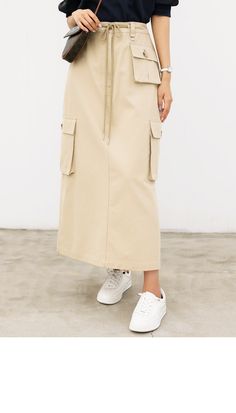 Style On Me Aaron Cargo Pocket Long Back Banding Skirt detail 네추럴핏감과 힙한 무드가 연출되는 아론 카고 포켓 롱 뒷밴딩 스커트 소개드려요~ 요즘 데일리 스트릿 아이템으로 핫한 카고 디자인으로 허리 사이즈 조절이 가능한 스트링 디테일과 뒷밴딩 처리로 편안한 착용감을 자랑하는 아이템이에요 탄탄한 코튼소재로 제작되어 늘어짐없이 깔끔한 핏이 연출되며 롱 기장이지만 뒷중심 슬릿 디테일을 주어 답답해보이지 않는 동시에 활동성이 있어 편안하고 이지하게 착용되는 스커트랍니다~ 양사이드 및 허리라인의 입체적인 포켓이 고퀄리티 디자인으로 포인트되어 스타일부터 실용성까지 둘다 잡은 매력템으로 데일리룩 및 워크웨어까지 다양하게 즐겨주세요 :) fabric & Design 면 100% 면 원단으로 제작되어 늘어짐 없는 탄탄한 핏감이 매력적이에요~ 오랜 착용에도 깔끔한 핏과 편안한 활동성을 보장해주는 잇템으로 올시즌 데일리룩 코디템이랍니다~ size Jeans For Petite Women, Jeans For Tall Women, Yoga Jeans, Beige Cargo, A Line Denim Skirt, Skirt Summer, Wide Jeans, Ykk Zipper