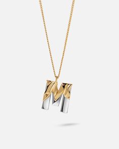 On a delicate curb chain, this unique initial M pendant necklace is here, with its deconstructed silhouette and contrasting colors, polished finishes breaking free from rough folds, filling the gaps in fashion for fun to coexist with a sense of free spirit.
The unwrapped signature is not merely well-made or cool-looking; it tells a whole story.
Sign off your necklace layers with a statment initial that say it all.





 





Length: 21.6in
Width: 2mm
Stone: Brown
Pendant Size: 26x13mm
Material: Cute Simple Necklaces, Letter M Necklace, Necklace Layers, Alphabet Jewelry, M Necklace, High Jewelry Ring, Light Jewelry, Letter Jewelry, Unique Pendant Necklace