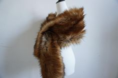 Other color is available too. Here is the listing for other color. https://www.etsy.com/listing/549654635/white-black-light-brown-ivory-gray-faux?ref=listings_manager_grid Faux fur stole Length 160-165cm and 175-180cm width 30cm Weight 500g-580g Regular shippment (ePacket ,Hongkong Post ,China Post ) Shipping time : 5-22days by regular shipment (ePacket ,China Post) We can make many colors of them,if you need special request,please feel free to contact us.Thanks! Brown Fur Shawl, Feather Cape, Faux Fur Shrug, Cape Wedding, Faux Fur Cape, Fur Shrug, Faux Fur Stole, Wedding Fur, Feather Jacket