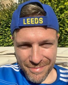 a close up of a person wearing a hat with the words leds on it